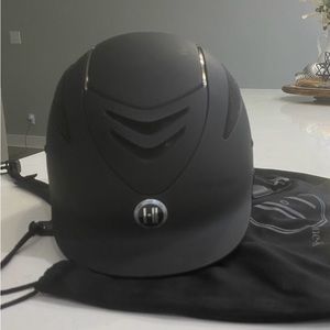 One K Defender equestrian helmet.